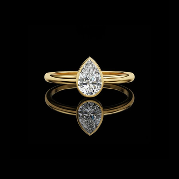Bezel set pear cut moissanite solitaire engagement ring by IVEVAR