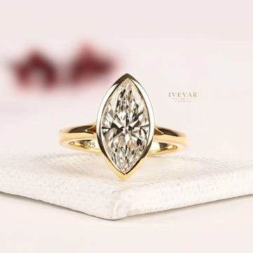 Bezel Set Marquise Cut Lab Split Shank Engagement Ring