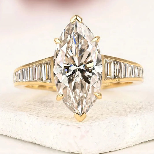 Marquise Cut Lab Diamond Ring with Baguette Side Stones and Tapered Band