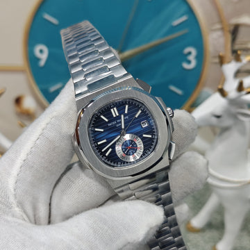 Designed for those who appreciate timeless craftsmanship and bold elegance, this stunning blue-dial