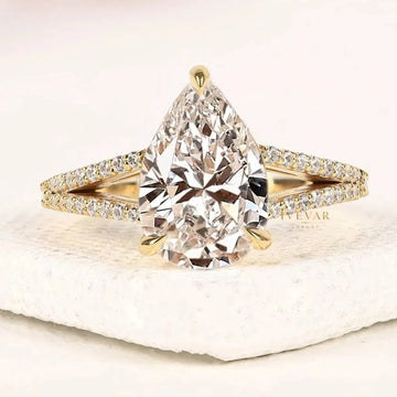 Pear Cut Moissanite Split Pave Shank Engagement Ring