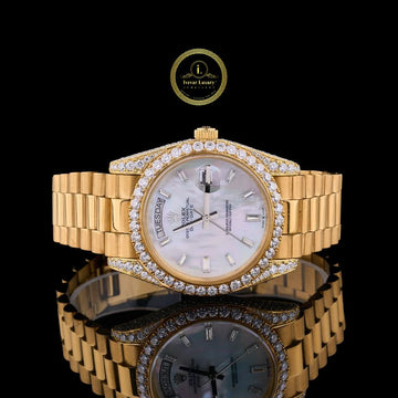 Daily Wear Day-Date in Yellow Gold, a Mother-of-Pearl Diamond Dial and Diamond-Set Bezel.