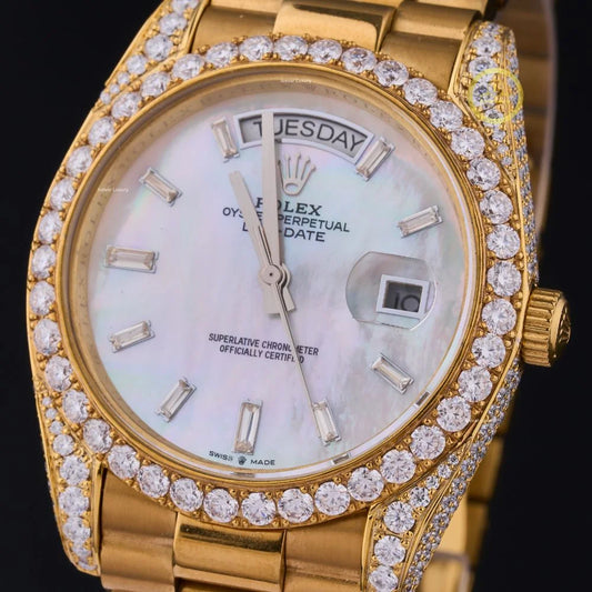 Daily Wear Day-Date in Yellow Gold, a Mother-of-Pearl Diamond Dial and Diamond-Set Bezel.