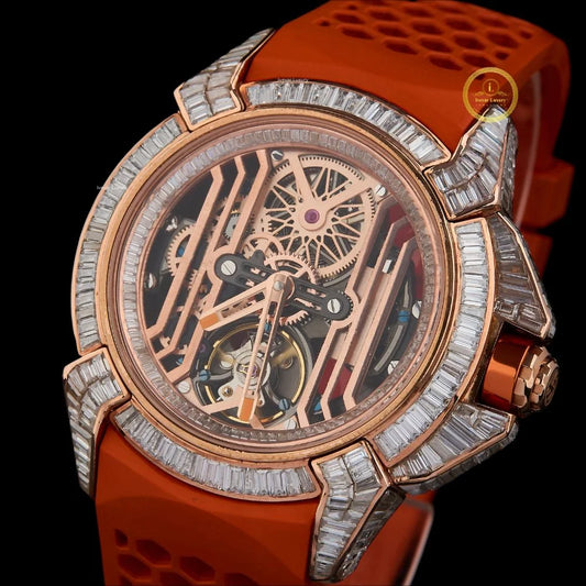 A Bold Rose Gold Watch with a Baguette Diamond Bezel, and Vibrant Orange Strap.