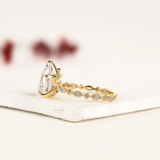 Pear Cut Moissanite Diamond Ring with Marquise Side Stones - View 2