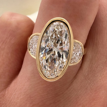 Oval Lab Diamond Bezel Set Ring With Half Moon Side Stone