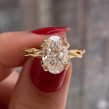 Oval Cut Lab Diamond Twisted Vine Leaf Solitaire Engagement Ring