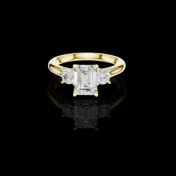 Classic Emerald With Round Side Moissanite Diamond Ring