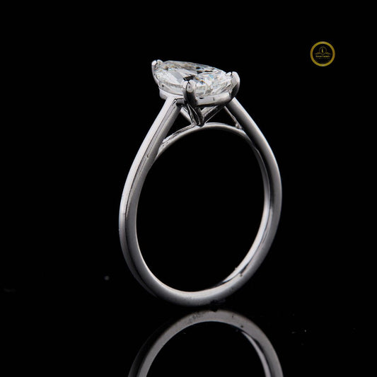 Pear Cut Solitaire Moissanite Diamond Engagement Ring With Cathedral Basket - View 2