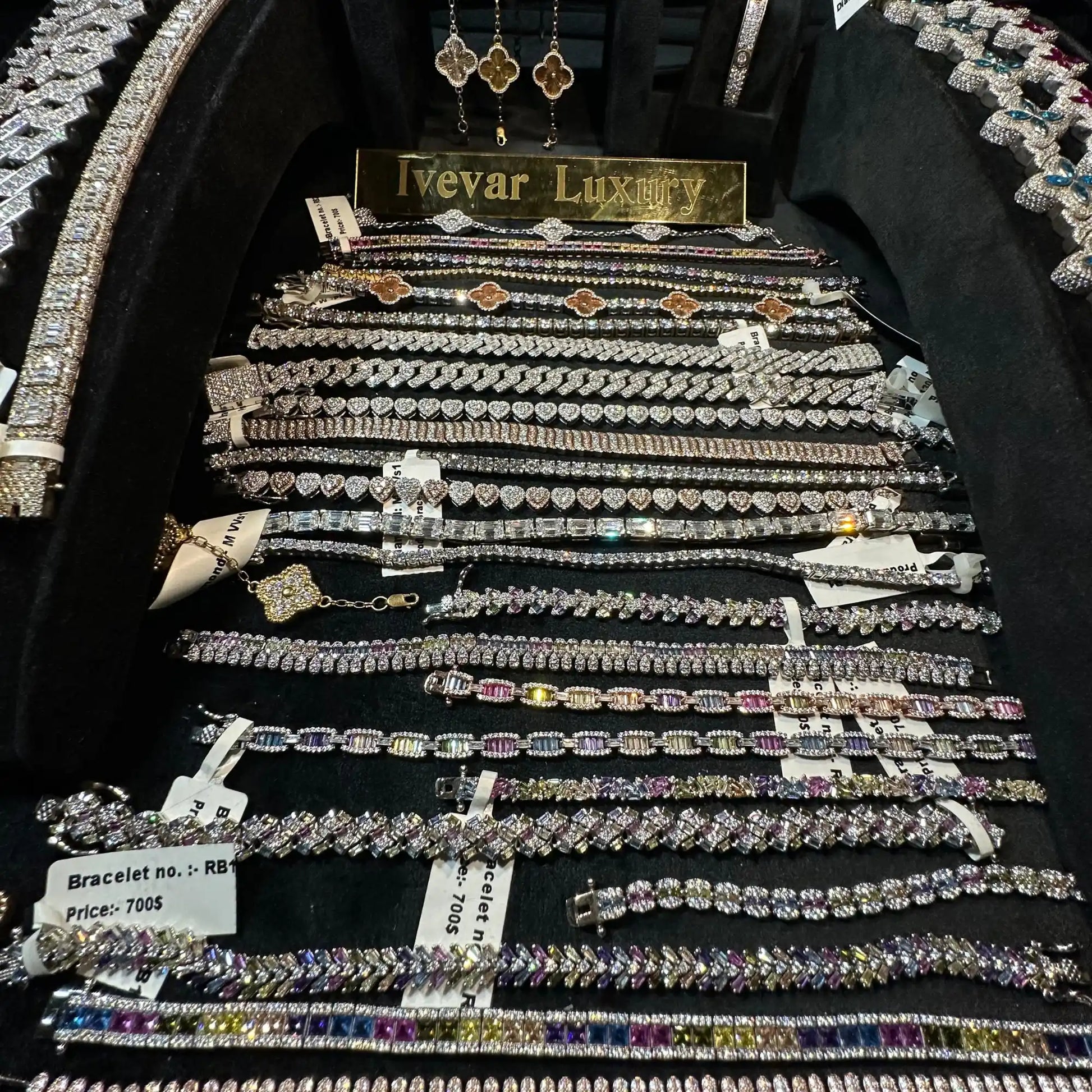 Collection of jewelry including bracelets and earrings