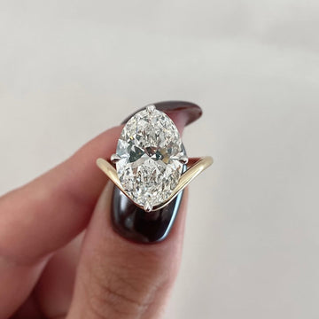 Oval Moissanite Diamond Solitaire Ring With Cathedral Band