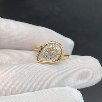 Pear Cut Moissanite Diamond Bezel Set Engagement Ring