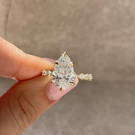 Pear Cut Solitaire Lab Diamond Engagement Ring With Twisted Pave Band - View 2