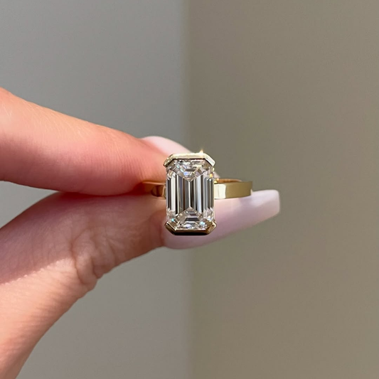 Emerald Moissanite Diamond Half Bezel Solitaire Ring With Wide Band