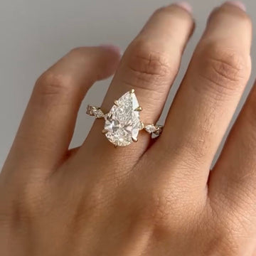 Pear Cut Solitaire Moissanite Diamond Ring With Twisted Pave Band