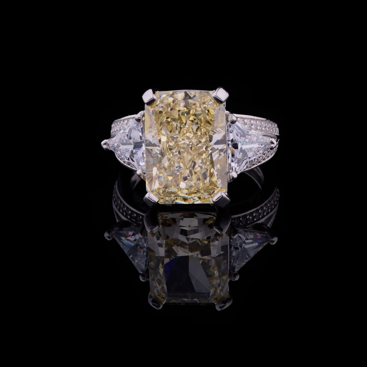 Fancy Intense Yellow Radiant Moissanite Diamond Ring With Trillion Cut Side Diamonds